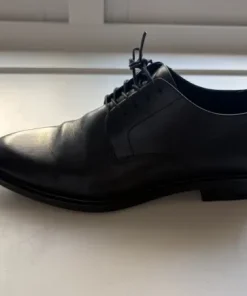 Eleganta svarta snörskor