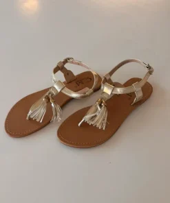 Guldiga sommar tofflor