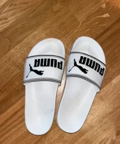 Puma tofflor