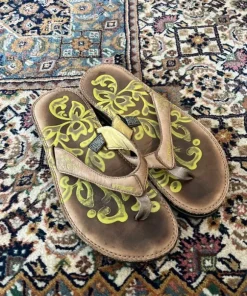 Teva brown leather flip flops