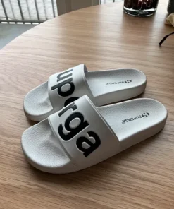 Tofflor från Superga