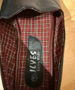 Tofflor i läder
